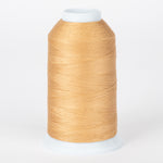 Almond colored thread wound on white plastic cone with clear protective cap