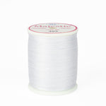 spool of majestic cotton quilting thread #403 pearly gates