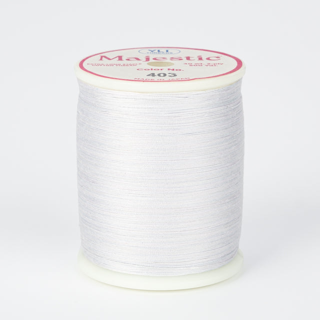 spool of majestic cotton quilting thread #403 pearly gates