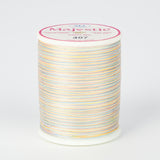 spool of majestic cotton quilting thread #407 sweet dreams