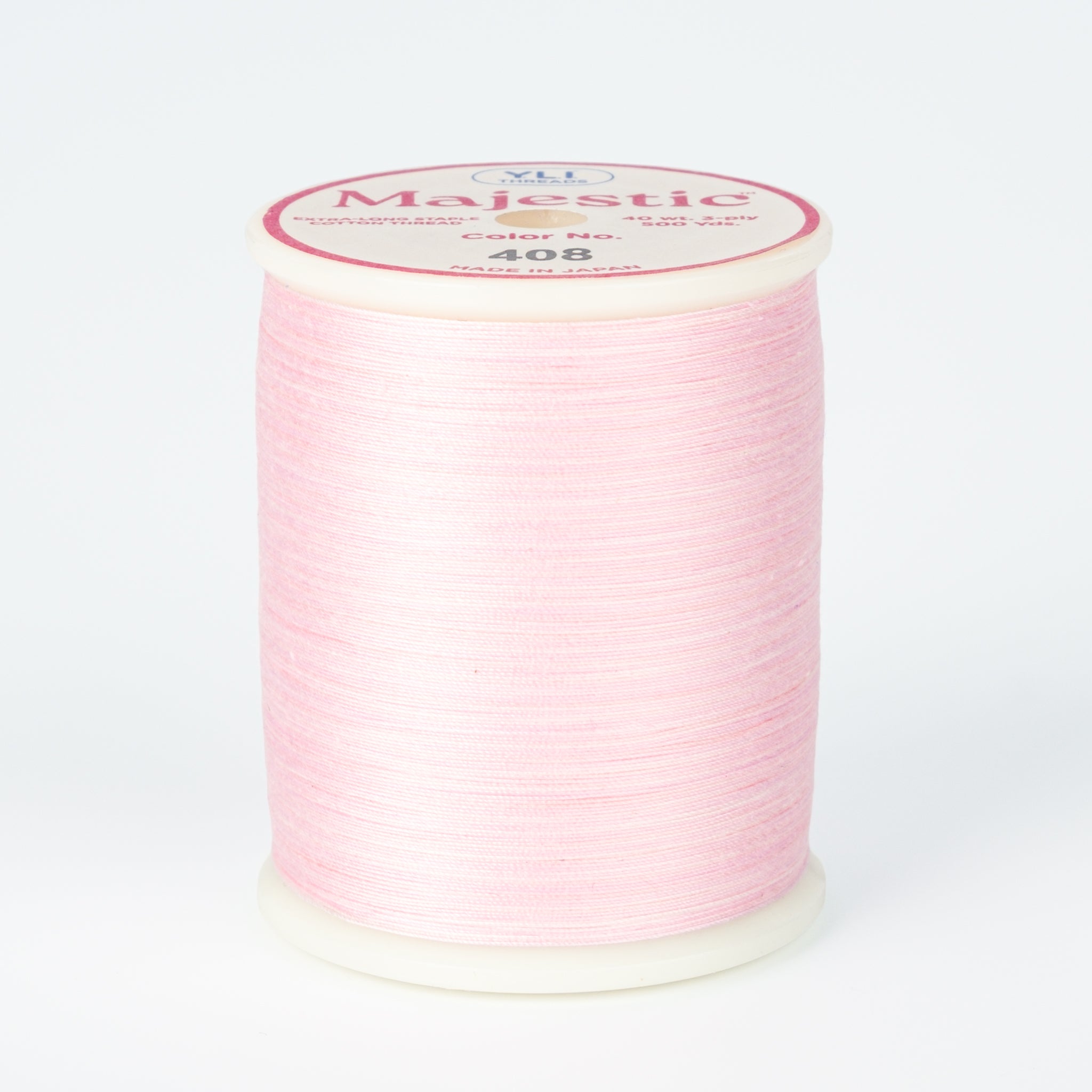 spool of majestic cotton quilting thread #408 baby girl