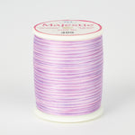 spool of majestic cotton quilting thread #409 wild orchid