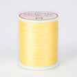 spool of majestic cotton quilting thread #415 lamplight