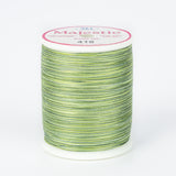 spool of majestic cotton quilting thread #418 palm tree