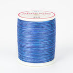 Blue variegated Majestic 40wt thread on white spool with pink and white label showing color number 429