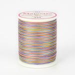 Rainbow variegated thread on white plastic spool with Majestic brand label, color number 434