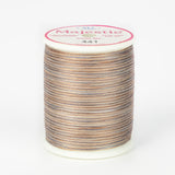 Cobblestone variegated thread on white spool with Majestic label, showing brown and gray multicolored pattern