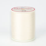 Natural white thread spool with Majestic brand label showing color number 446