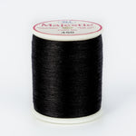 Black thread wound on white plastic spool with Majestic brand label, color number 450 visible on top