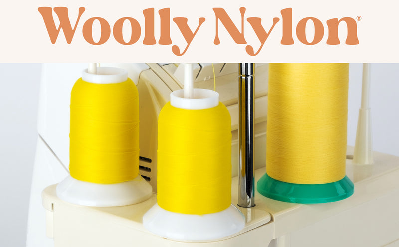 yellow cones of woolly nylon textured looper thread on a serger