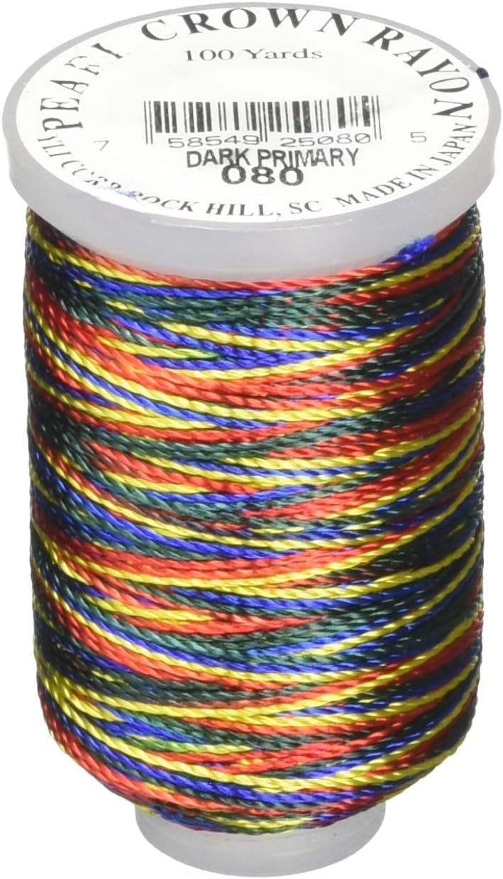 Multicolored variegated rayon thread on white mini cone spool with dark red, blue, yellow, and green stripes.