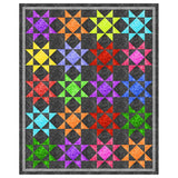 Colorful star quilt pattern featuring vibrant multi-colored star blocks arranged in rows on a dark gray background with matching border.