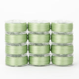 precision polyester thread class 15 prewound bobbins #219 spearmint green dozen pack