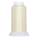 Macadamia colored thread wound on white plastic cone with wide base
