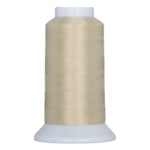 Stepping stone beige thread wound on white plastic cone spool against white background