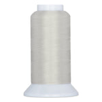Off-white thread wound on white plastic cone spool with wide base