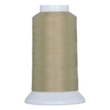 Flagstone colored thread wound on white plastic cone spool with tapered base and top cap