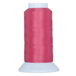Pink thread wound on white plastic cone spool against white background