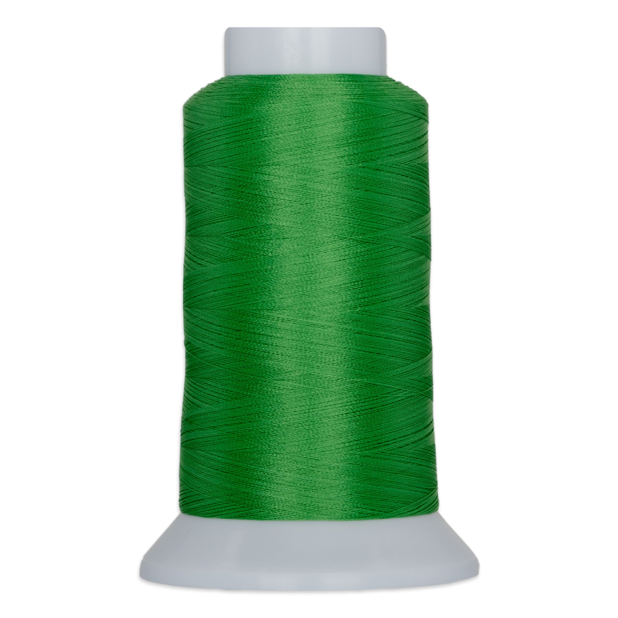 Irish green thread wound on white plastic cone with wide base and narrow top