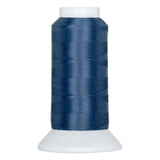 Deep blue thread cone with white plastic cap and base, showing neatly wound polyester thread