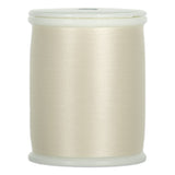Macadamia colored thread wound on white plastic spool with visible thread texture and clean edges