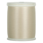 Cream-colored thread wound on white plastic spool with visible thread texture and smooth finish