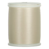 Cream-colored thread wound on white plastic spool with visible thread texture and smooth finish