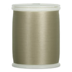 Khaki colored thread wound on white plastic spool with smooth, lustrous finish