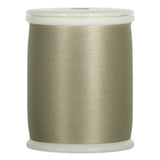 Khaki colored thread wound on white plastic spool with smooth, lustrous finish