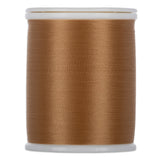 Toffee brown thread wound on white plastic spool with smooth, even layers visible