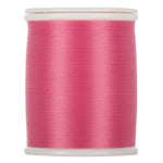 Pink thread wound on white plastic spool with visible thread texture and clean edges