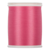 Pink thread wound on white plastic spool with visible thread texture and clean edges