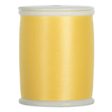 Yellow thread wound on white plastic spool with clear plastic ends