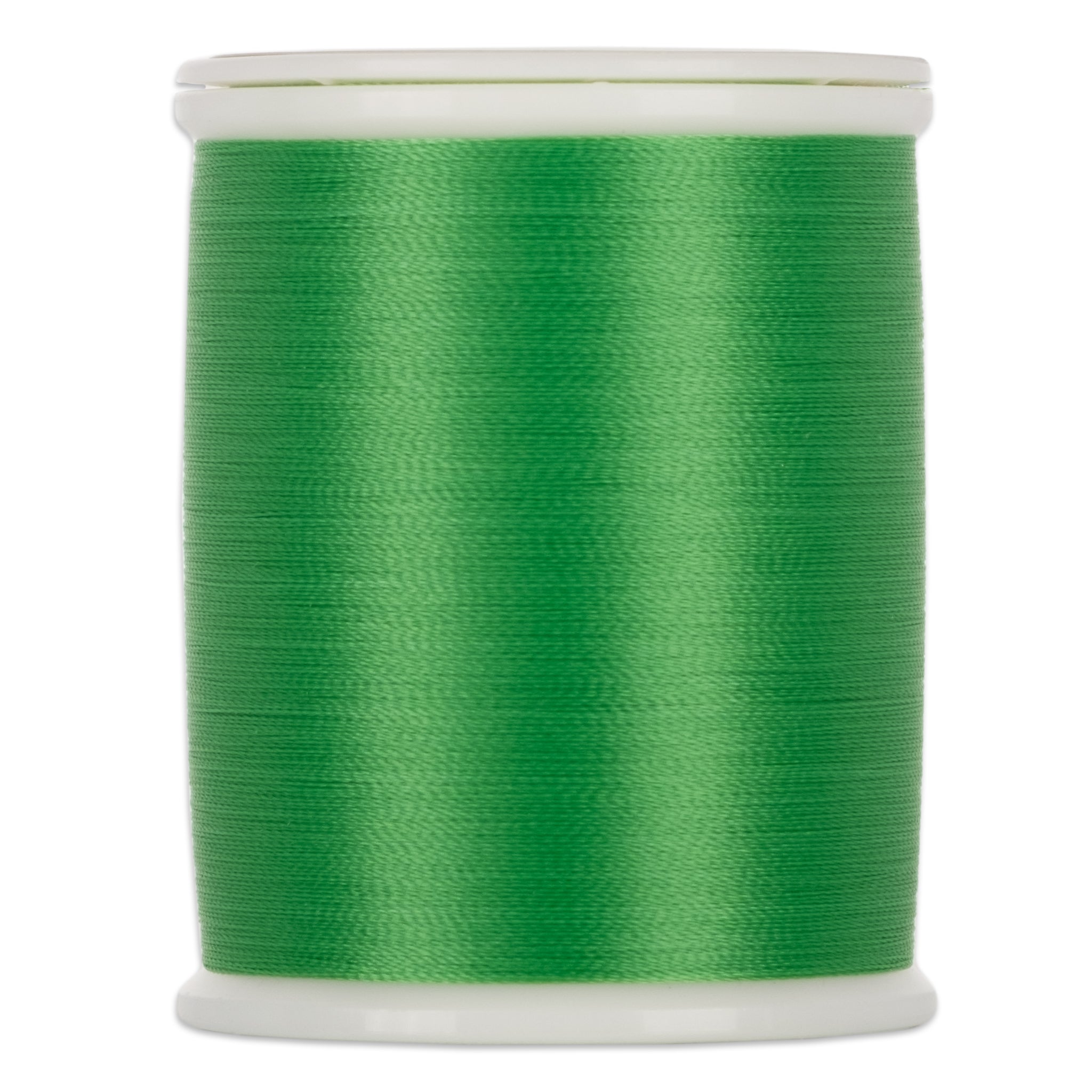 Green sewing thread wound on white plastic spool with clear top and bottom caps