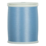 Blue pearl 60 weight thread on white plastic spool with smooth, lustrous finish