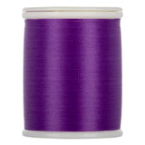 Royal purple thread wound on white plastic spool with clear bands at top and bottom