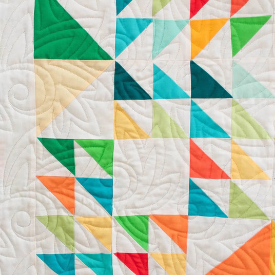 colorful quilt block showing quilted design