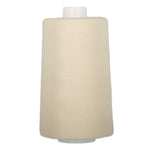 Antique lace colored thread wound on large white cone spool with plastic top