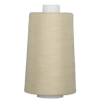 Travertine beige thread wound on white plastic cone spool