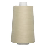 Travertine beige thread wound on white plastic cone spool