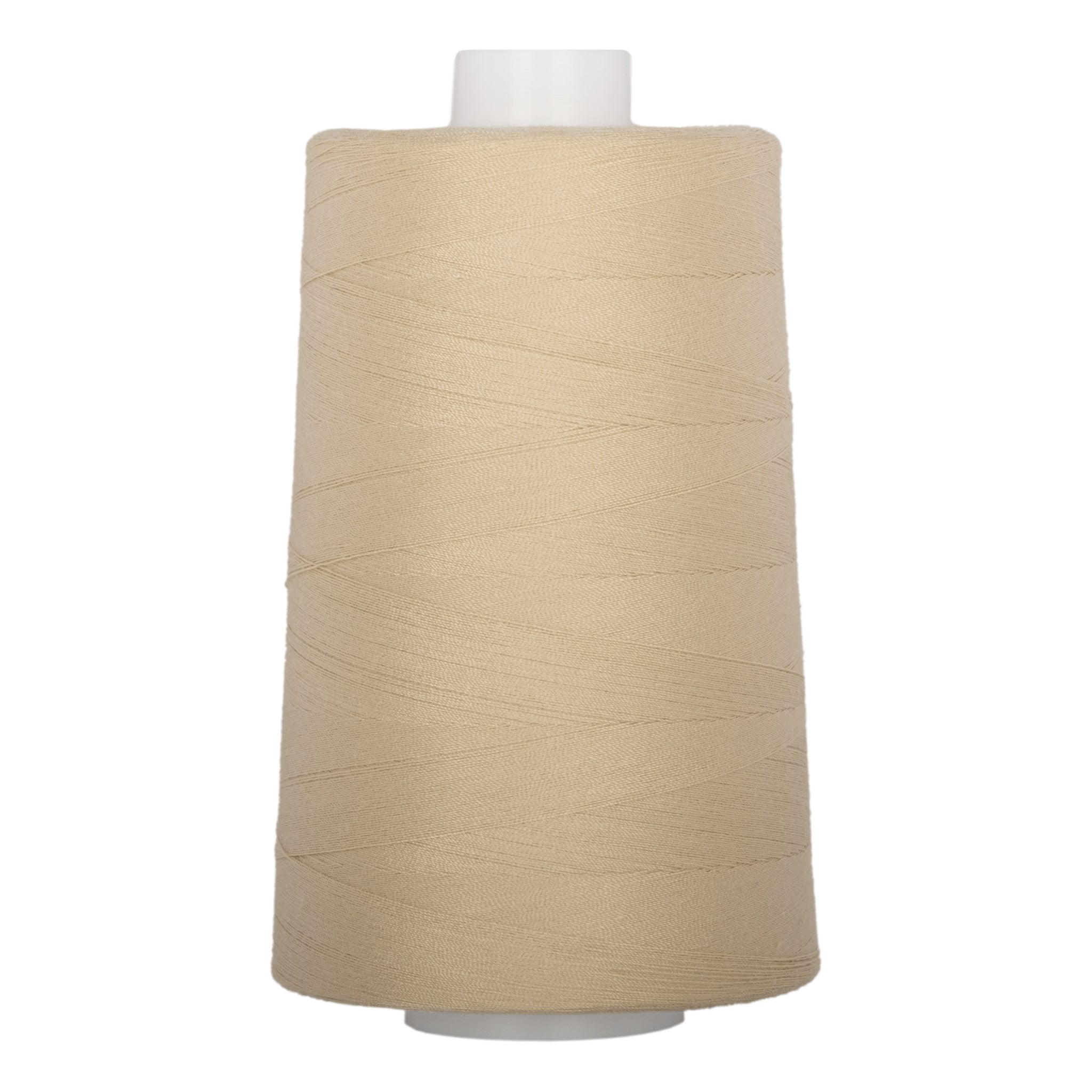 Almond colored thread wound on white plastic cone with neat, even layers visible