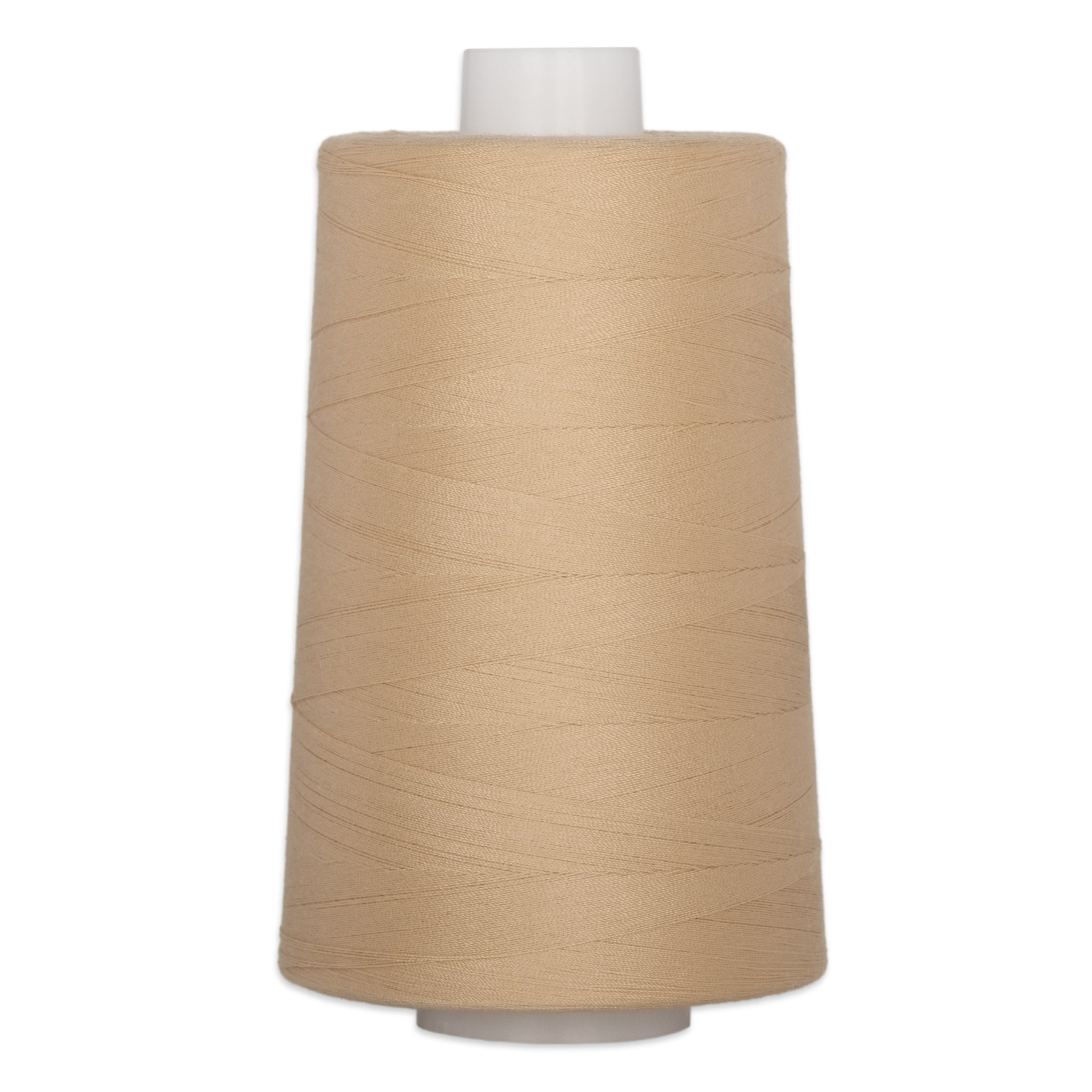 Champagne colored thread wound on a large white plastic cone spool
