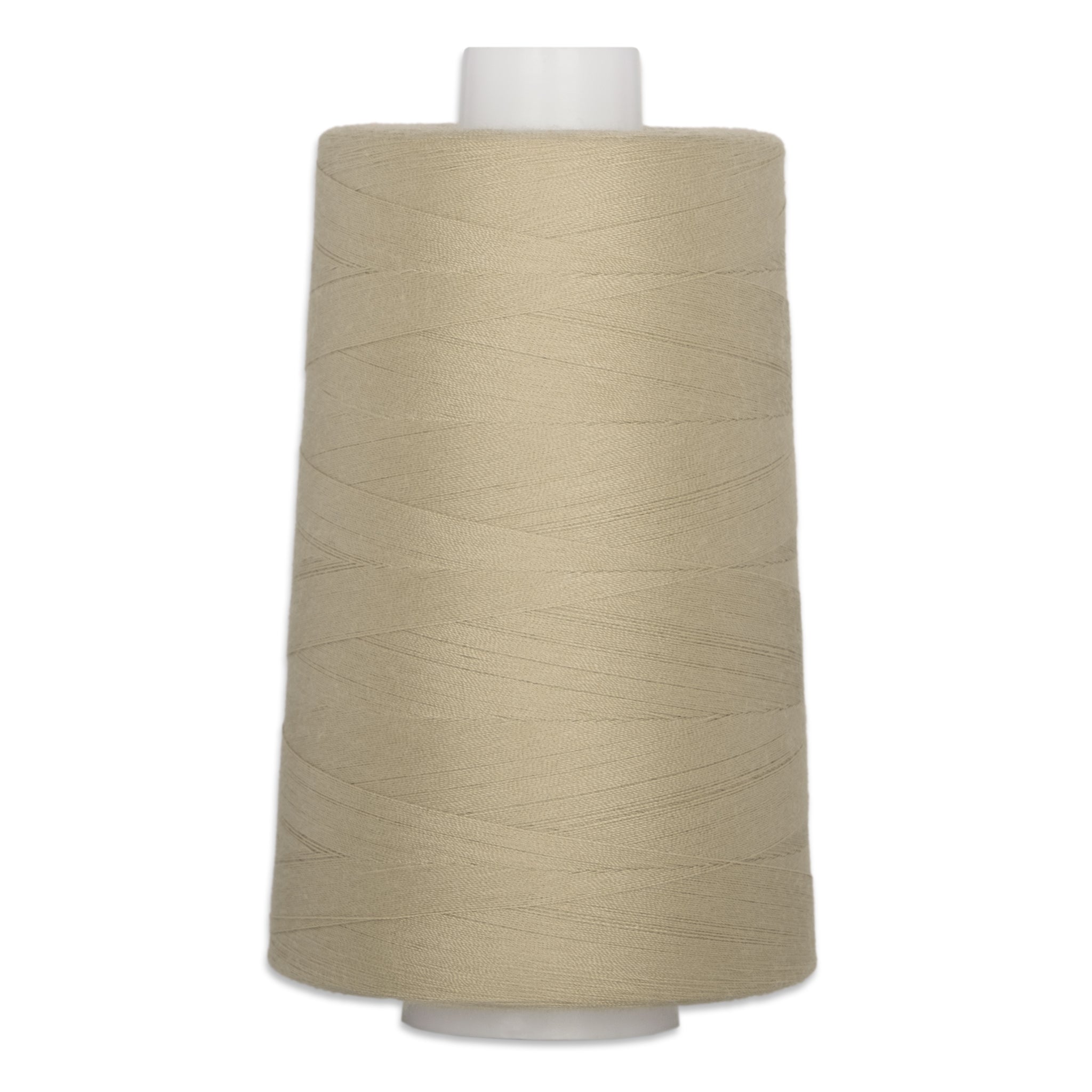 Fawn colored thread wound on white plastic cone spool
