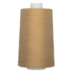 Coyote brown thread wound on large white cone spool with smooth, even layers