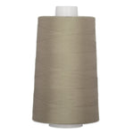 Canadian Geese colored thread cone with beige-gray thread wound on white plastic cone spool