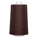 Mahogany brown thread wound on white plastic cone with even, tight wrapping
