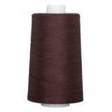 Mahogany brown thread wound on white plastic cone with even, tight wrapping