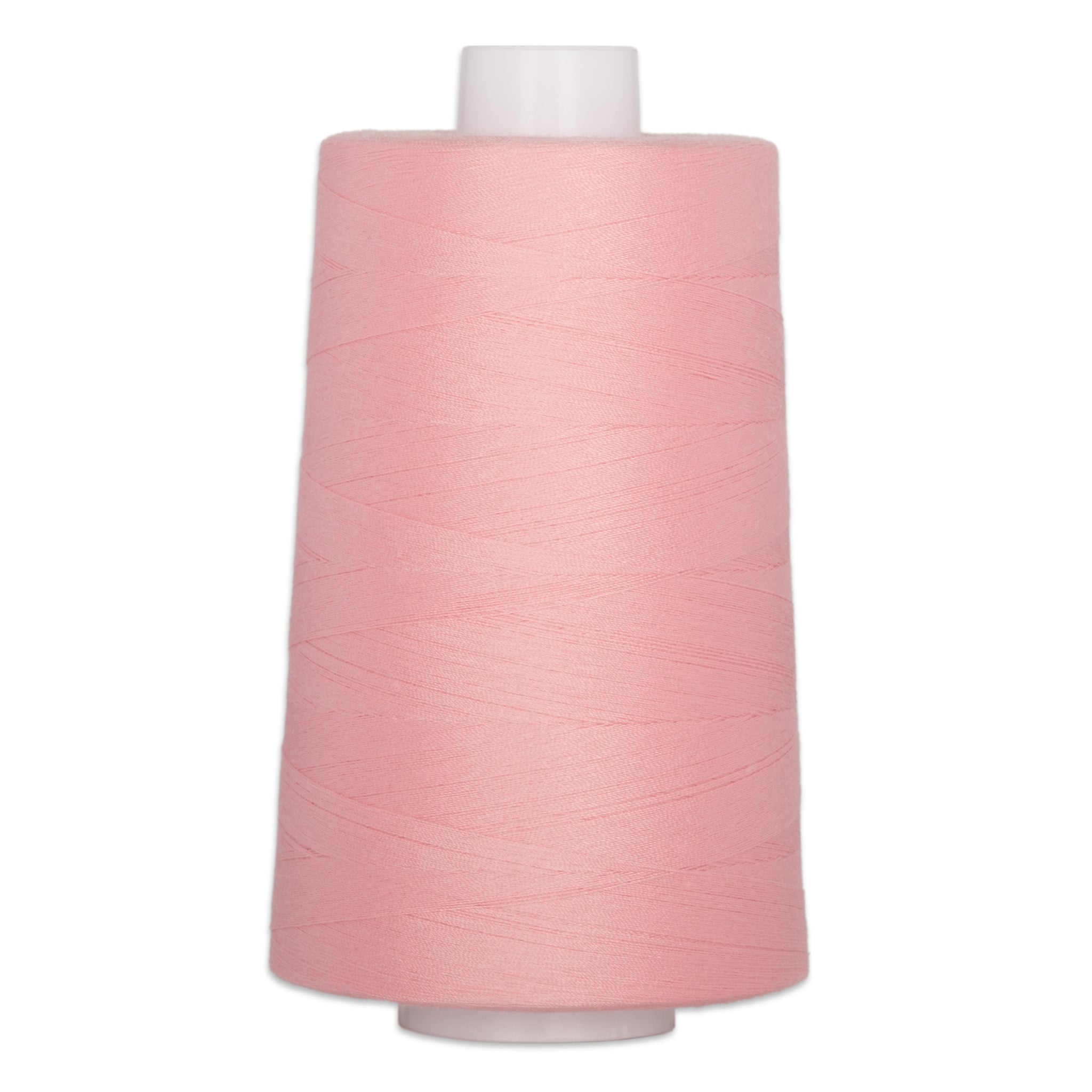 Pink thread wound on white plastic cone spool for quilting and sewing