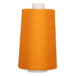 Orange polyester quilting thread on white cone spool, 40 weight, 6000 yards