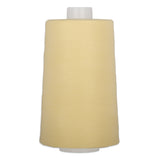 Buttercream yellow polyester quilting thread on large cone spool with white plastic ends